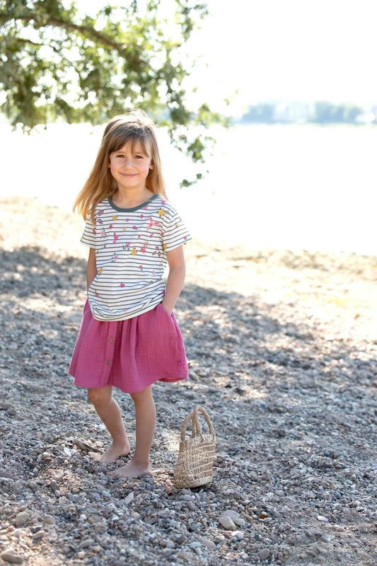 Muslin skirt with buttons in mallow